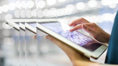 businesswoman using digital tablet with pulse