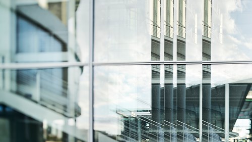 modern glass building with pulse