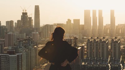 woman looking at city with pulse