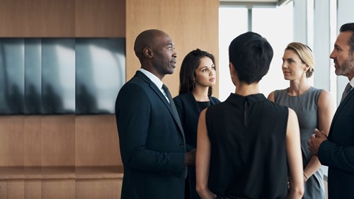 Group of business people talking pulsed